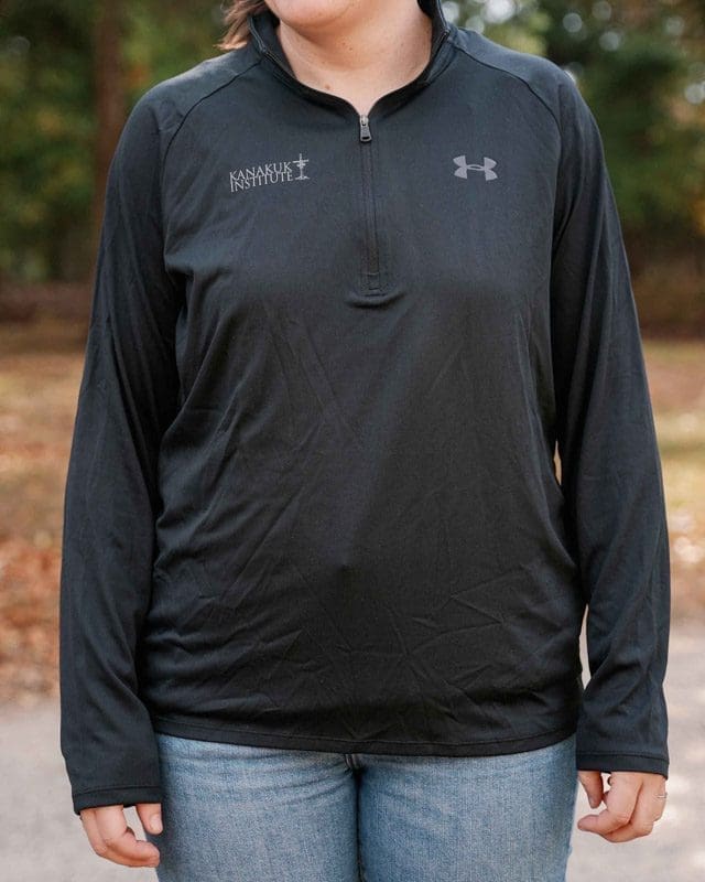 Black Pullover. Model is a 5’7” female wearing a large.